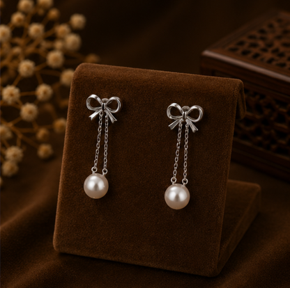 Rosé Bow Pearl Drop Earrings
